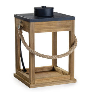The Wood & Rope Candle Warmer, ideal for modern farmhouse decor, showcases an open rectangular wooden frame with a sleek black metal top. Equipped with a sturdy rope handle on each side, it is crafted to hold a candle or light source that can be easily seen through its open sides. The thick rope handles loop comfortably for carrying.